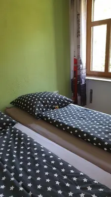 Ein Bett oder Betten in einem Zimmer der Unterkunft Ferienwohnung an der Begerburg