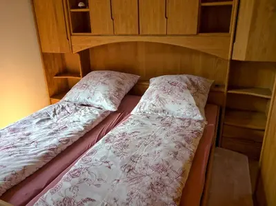 Ein Bett oder Betten in einem Zimmer der Unterkunft Idyllische Ferienwohnung in Zentrumsnähe