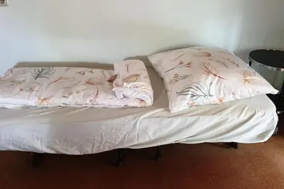 Ein Bett oder Betten in einem Zimmer der Unterkunft Idyllische Ferienwohnung in Zentrumsnähe
