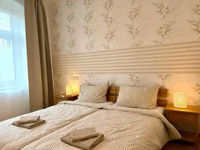 Ein Bett oder Betten in einem Zimmer der Unterkunft FEWO 1 Landeskrone Dresden