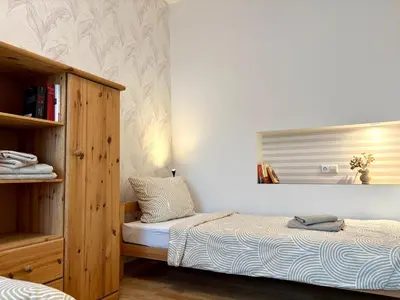 Ein Bett oder Betten in einem Zimmer der Unterkunft FEWO 1 Landeskrone Dresden