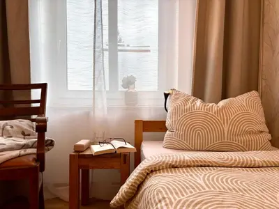 Ein Bett oder Betten in einem Zimmer der Unterkunft FEWO 1 Landeskrone Dresden