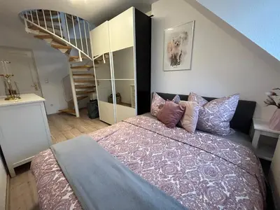 Ein Bett oder Betten in einem Zimmer der Unterkunft 105 QM neues klimatisiertes Appartment für Familien Privater Parkplatz