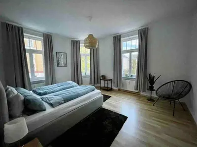 Ein Bett oder Betten in einem Zimmer der Unterkunft Ein gemütlicher Platz im Gründerzeitviertel