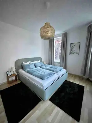 Ein Bett oder Betten in einem Zimmer der Unterkunft Ein gemütlicher Platz im Gründerzeitviertel