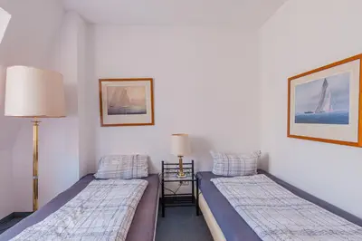 Ein Bett oder Betten in einem Zimmer der Unterkunft Pension für Monteure in Dresden, Zimmer mit eigenem Bad und großer Gemeinschaftsküche