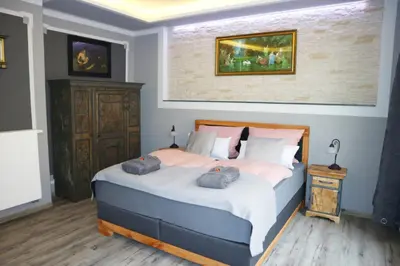 Ein Bett oder Betten in einem Zimmer der Unterkunft Apartment Alte Schusterei