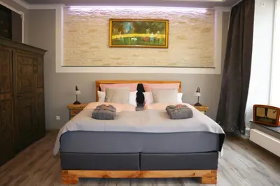 Ein Bett oder Betten in einem Zimmer der Unterkunft Apartment Alte Schusterei
