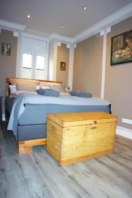 Ein Bett oder Betten in einem Zimmer der Unterkunft Apartment Alte Schusterei