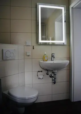 Ein Badezimmer in der Unterkunft Kontorhaus Senftenberg