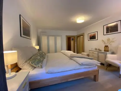 Ein Bett oder Betten in einem Zimmer der Unterkunft FeWo Ostrau, neues Bad, neue Küche, zentral, Sandstein-Ferien, Terrasse