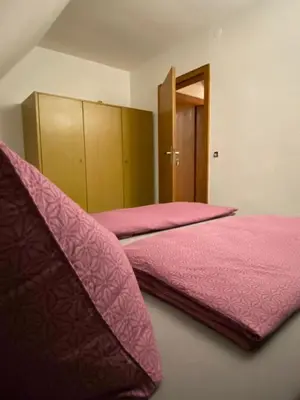 Ein Bett oder Betten in einem Zimmer der Unterkunft Am Fuße zur Napoleonschanze