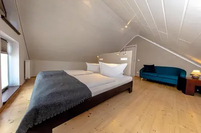 Ein Bett oder Betten in einem Zimmer der Unterkunft Laasenhof