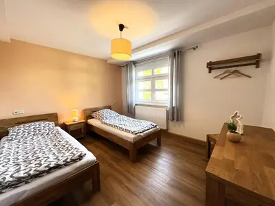 Ein Bett oder Betten in einem Zimmer der Unterkunft Apartment-Haus Landeskrone