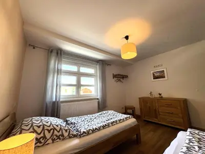Ein Bett oder Betten in einem Zimmer der Unterkunft Apartment-Haus Landeskrone