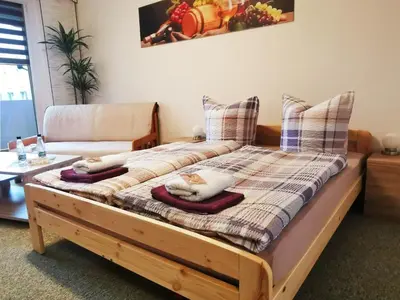 Ein Bett oder Betten in einem Zimmer der Unterkunft Fewo Oeffingener Meißen