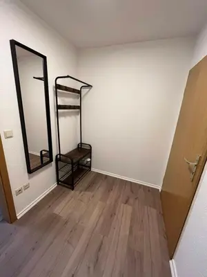 Ein Bett oder Betten in einem Zimmer der Unterkunft Neue 45 QM Eigentumswohnung, Balkon, Tiefgarage