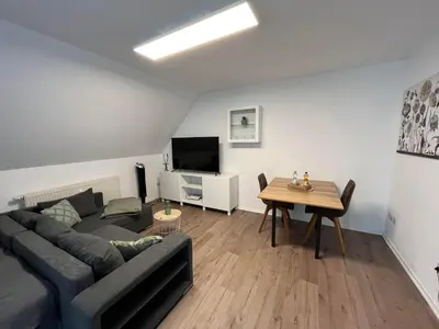 Ein Sitzbereich in der Unterkunft Neue 45 QM Eigentumswohnung, Balkon, Tiefgarage