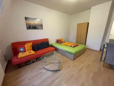 Ein Sitzbereich in der Unterkunft Apartments Strehlen