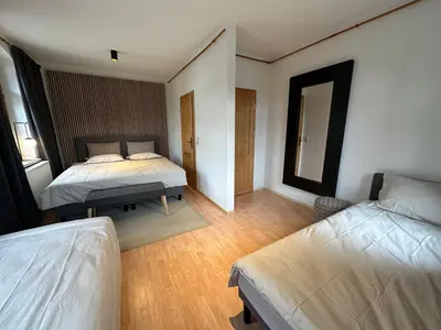Ein Bett oder Betten in einem Zimmer der Unterkunft Ferienhaus 