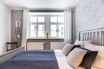 Ein Bett oder Betten in einem Zimmer der Unterkunft Elbsandstein-Suite Pirna Altstadt Stadtzentrum