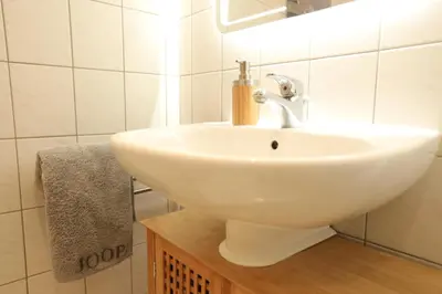 Ein Badezimmer in der Unterkunft Elbsandstein-Suite Pirna Altstadt Stadtzentrum