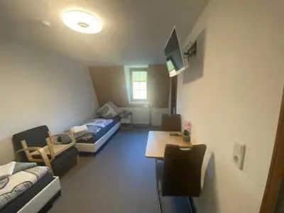 Ein Bett oder Betten in einem Zimmer der Unterkunft Zimmervermietung Abir