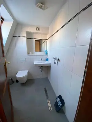 Ein Badezimmer in der Unterkunft Zimmervermietung Abir