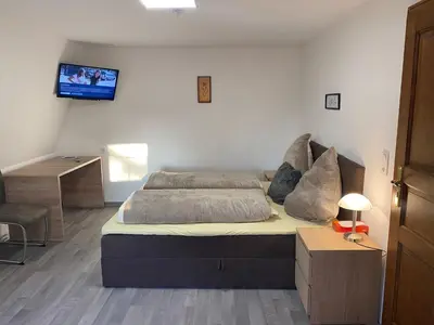 Ein Bett oder Betten in einem Zimmer der Unterkunft Zimmervermietung Abir