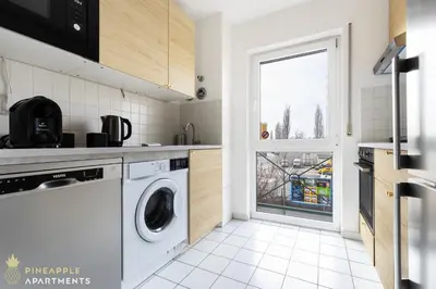 Küche/Küchenzeile in der Unterkunft PINEAPPLE APARTMENTS - Dresden Mitte III - free parking