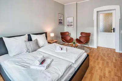 Ein Bett oder Betten in einem Zimmer der Unterkunft cozy Apartment -Kerner- in Meißen mit MagentaPlus
