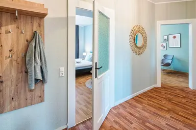 Ein Bett oder Betten in einem Zimmer der Unterkunft cozy Apartment -Kerner- in Meißen mit MagentaPlus