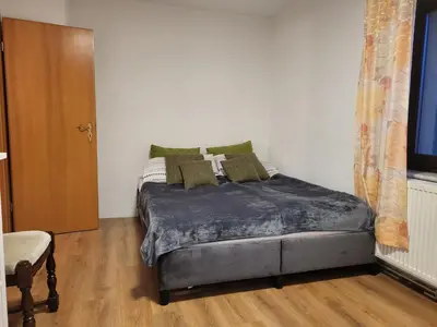 Ein Bett oder Betten in einem Zimmer der Unterkunft Haus Svetlana Ferienwohnung