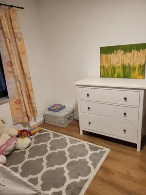 Ein Bett oder Betten in einem Zimmer der Unterkunft Haus Svetlana Ferienwohnung