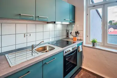 Küche/Küchenzeile in der Unterkunft cozy Apartment -Traminer- mit MagentaPlus