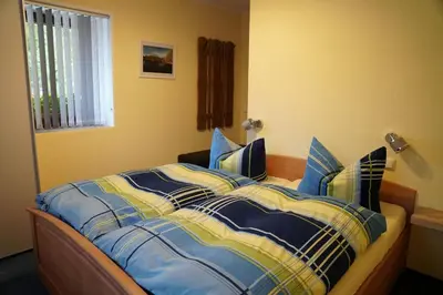 Ein Bett oder Betten in einem Zimmer der Unterkunft Ferienwohnung Splitek