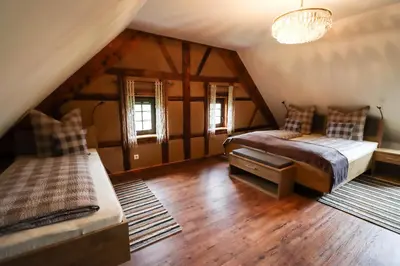 Ein Bett oder Betten in einem Zimmer der Unterkunft Ferienhaus Alpaka Glück