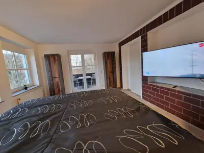Ein Bett oder Betten in einem Zimmer der Unterkunft Spatzennest