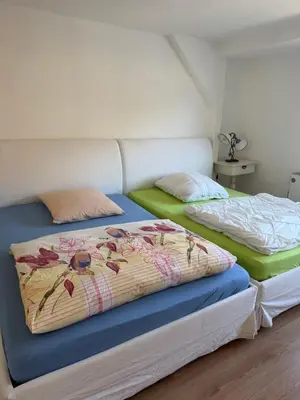 Ein Bett oder Betten in einem Zimmer der Unterkunft Elbblick
