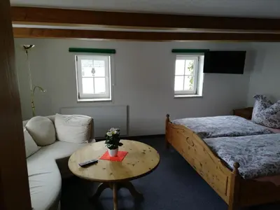Ein Bett oder Betten in einem Zimmer der Unterkunft Ferienhaus 3 Eulen