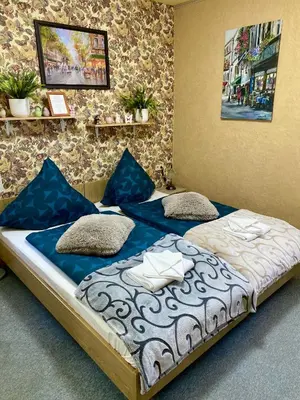 Ein Bett oder Betten in einem Zimmer der Unterkunft Haus ZUR PINGE