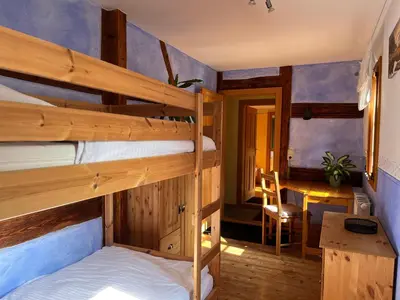 Ein Bett oder Betten in einem Zimmer der Unterkunft Ferienwohnung im Erzgebirge
