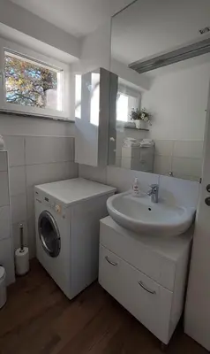 Ein Badezimmer in der Unterkunft Stilvolle Wohnung in Elbnähe mit Balkon, Parkplatz