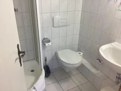 Ein Badezimmer in der Unterkunft Hotel Eintracht