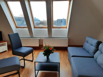 Ein Sitzbereich in der Unterkunft cosy home