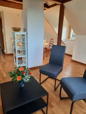 Ein Sitzbereich in der Unterkunft cosy home