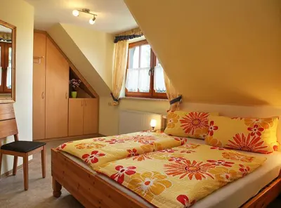 Ein Bett oder Betten in einem Zimmer der Unterkunft Spielzeugmacherhaus