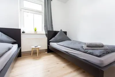 Ein Sitzbereich in der Unterkunft Schicke Wohnung mit 3 Schlafzimmern, vollausgestatteter Küche & Bad - Bettwäsche, Handtücher und WiFi inklusive