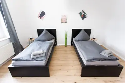 Ein Sitzbereich in der Unterkunft Schicke Wohnung mit 3 Schlafzimmern, vollausgestatteter Küche & Bad - Bettwäsche, Handtücher und WiFi inklusive