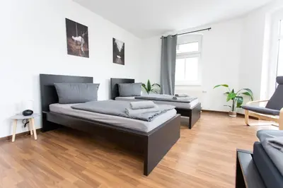Ein Sitzbereich in der Unterkunft Schicke Wohnung mit 3 Schlafzimmern, vollausgestatteter Küche & Bad - Bettwäsche, Handtücher und WiFi inklusive